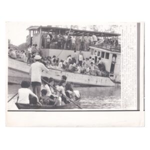 Associated Press Wire Photograph - South Vietnamese Refugees Evacuating by River Boat, Mekong Delta - March 1974