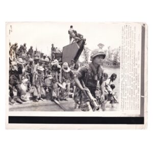 Associated Press Wire Photograph - Cambodian Refugees and Government Troops Evacuated by River Craft - March 1974