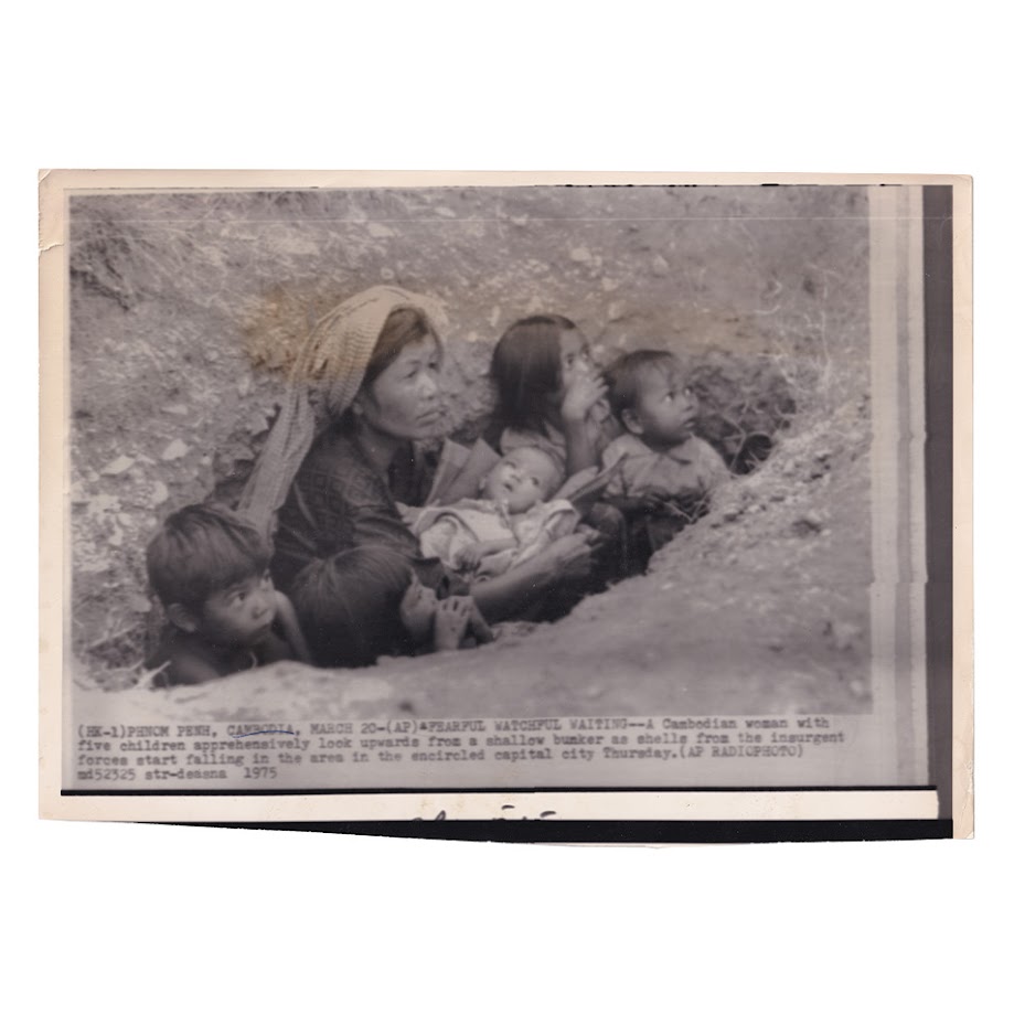 Associated Press Wire Photograph - Cambodian Family Sheltering During Bombardment of Phnom Penh - March 1975 1 Associated Press Wire Photograph - Cambodian Family Sheltering During Bombardment of Phnom Penh - March 1975