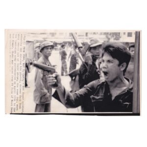 Fall of Phnom Penh - Khmer Rouge Soldier Ordering Shopkeepers into the Streets - Original Associated Press Wirephoto - 17 April 1975