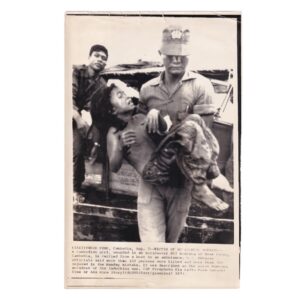 Home 6 Neak Luong Bombing - Wounded Cambodian Girl Carried to an Ambulance - Original Associated Press Wirephoto - 7 August 1973