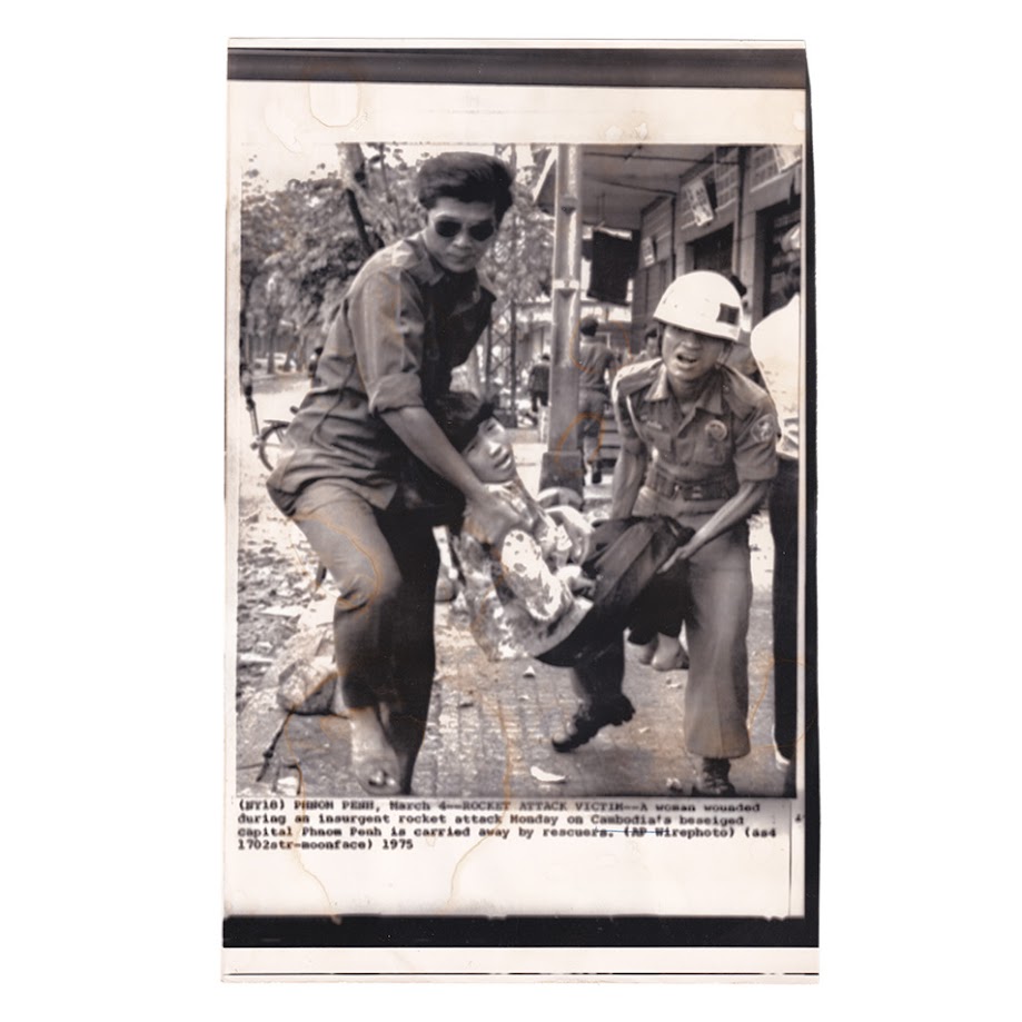 Rocket Attack Victim Carried to Safety in Phnom Penh - Original Associated Press Wirephoto - 4 March 1975 1 Rocket Attack Victim Carried to Safety in Phnom Penh - Original Associated Press Wirephoto - 4 March 1975
